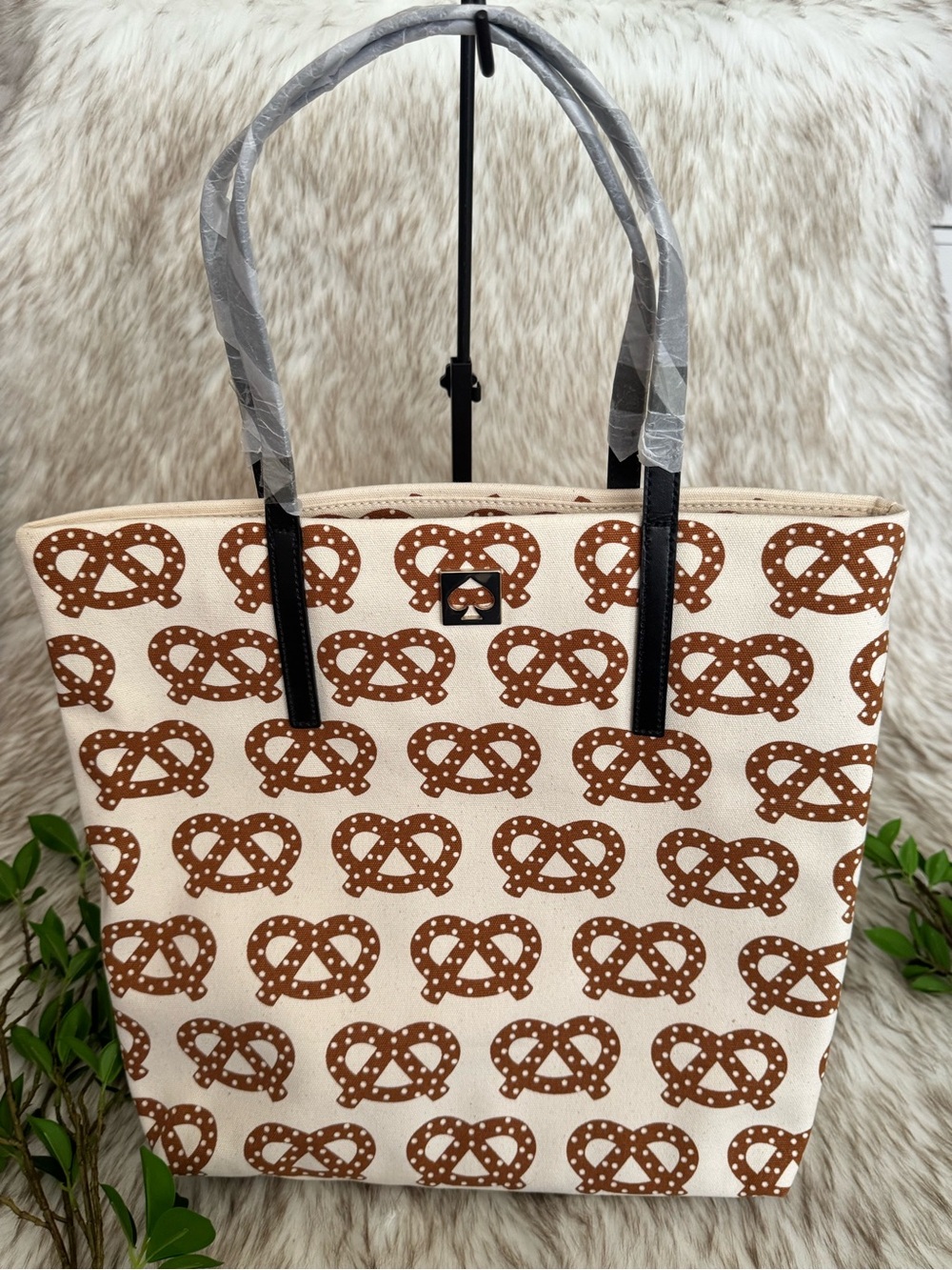 kate spade Cream Canvas Tote with Brown Pretzel Print and Black Handles